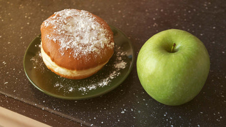 Donut next to a green apple - Kaizen Naturals